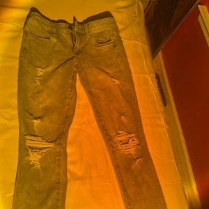 Light blue ripped jeans